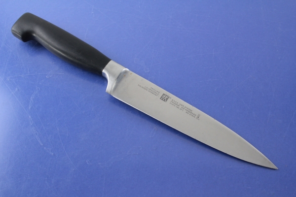 Zwilling Henckels Vier Sterne Kochmesser Edelstahl